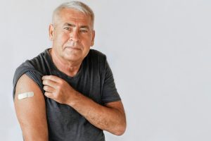 Older man after getting new covid vaccine