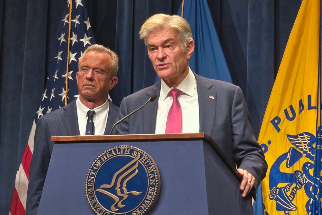 Health and Human Services Secretary Robert F. Kennedy Jr. (left) and Centers for Medicare & Medicaid Services Administrator Mehmet Oz announced Monday the Trump administration has struck a deal with dozens of health insurers to improve and facilitate prior authorization, a process often used to deny health claims that has plagued patients and doctors for decades because it delays or restricts care. (PHIL GALEWITZ/KFF HEALTH NEWS)