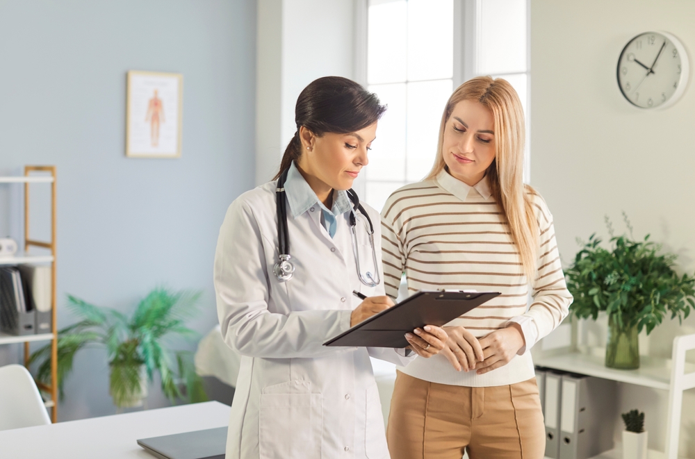 NP talking to patient about perimenopause