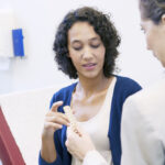 NP discussing contraception with patient