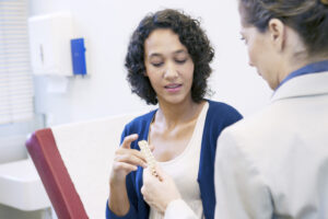 NP discussing contraception with patient