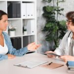 NP talking with patient