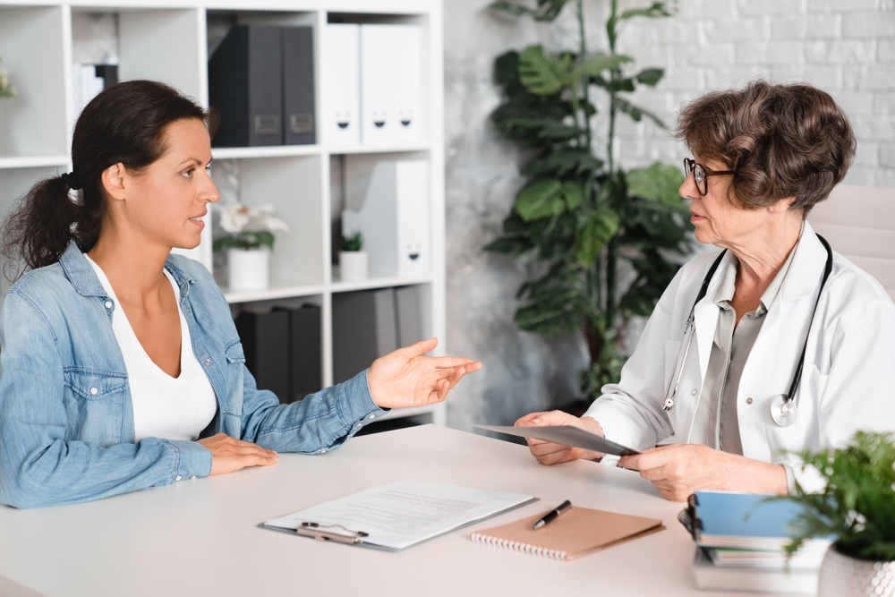 NP talking with patient